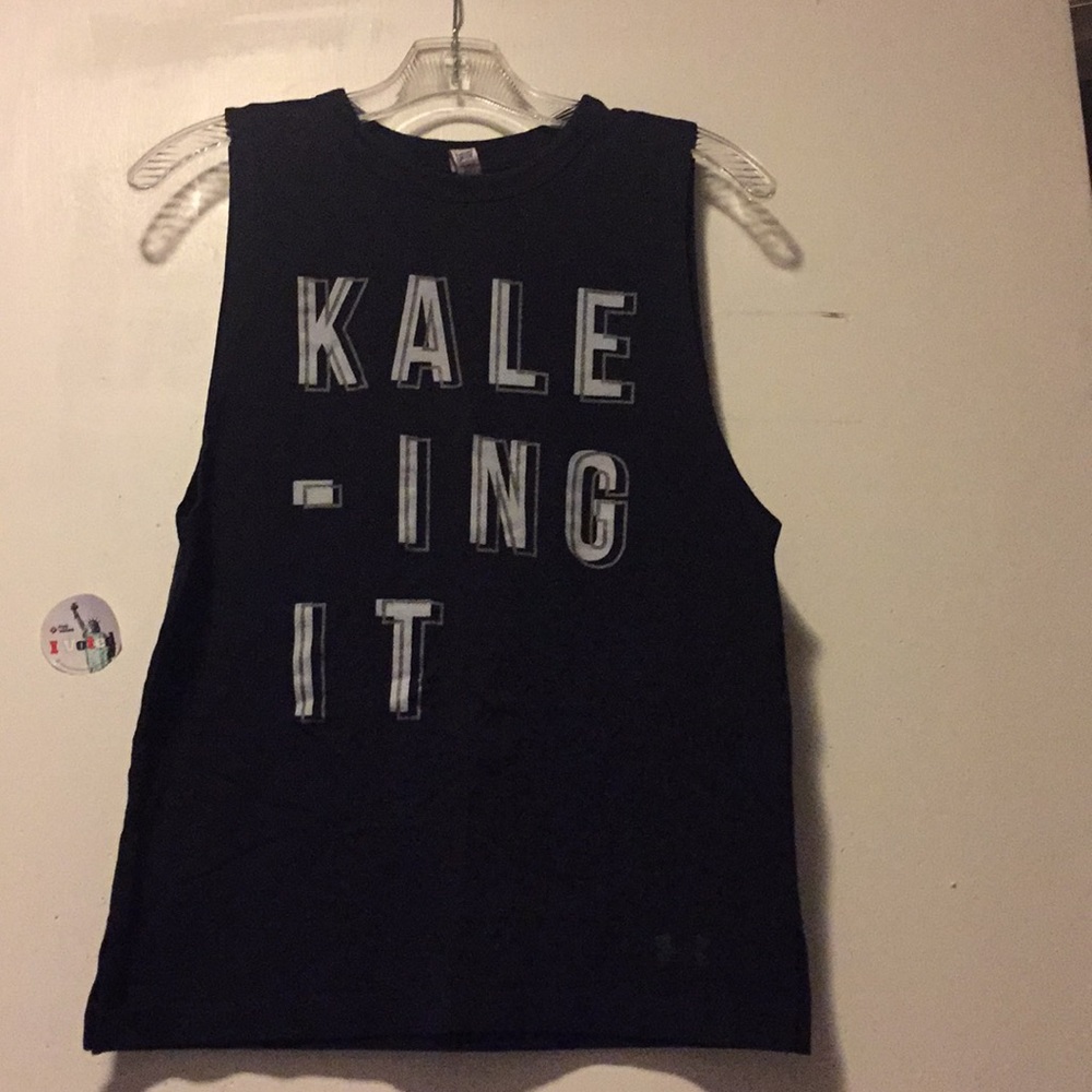 Under Armour muscle tank.